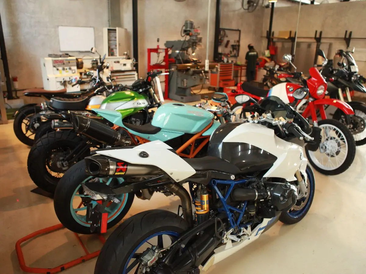 Bikes in different colours lined up on stands