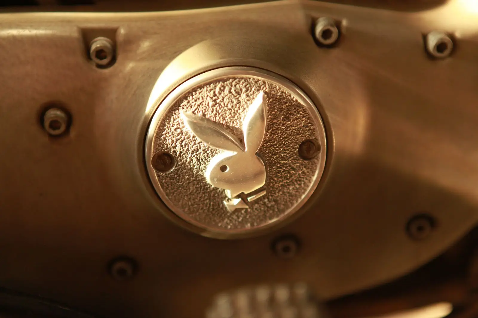 A bright-plated engine cover