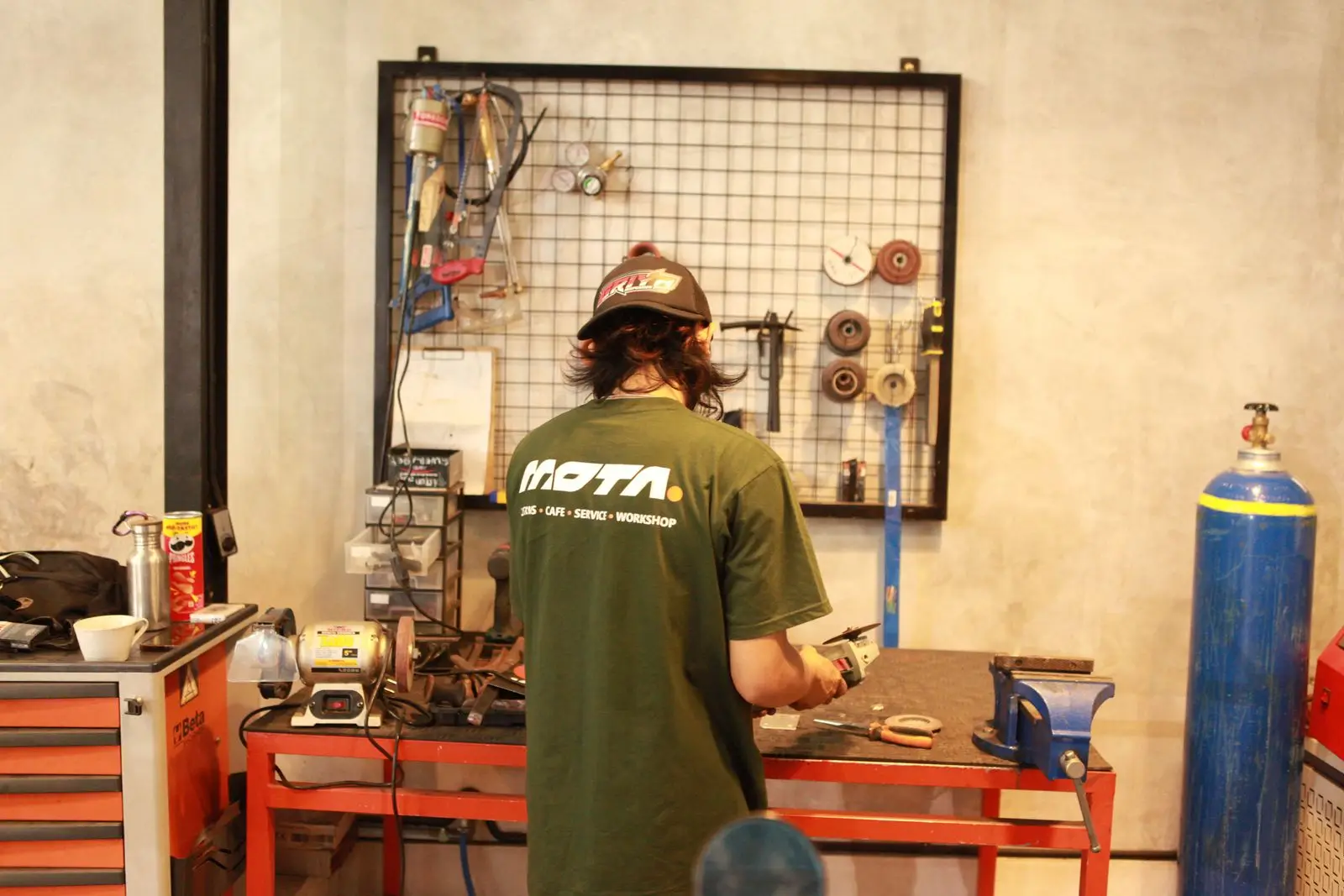 A mechanic at the workbench